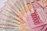 Rupiah terus menguat dan kembali ke level Rp 14.200 per USD
